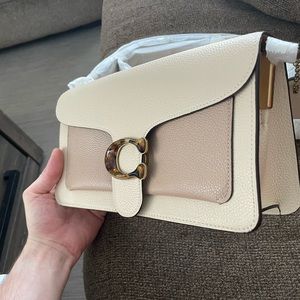 Coach shoulder bag two tone with herringbone logo. (Ivory Taupe Multi)